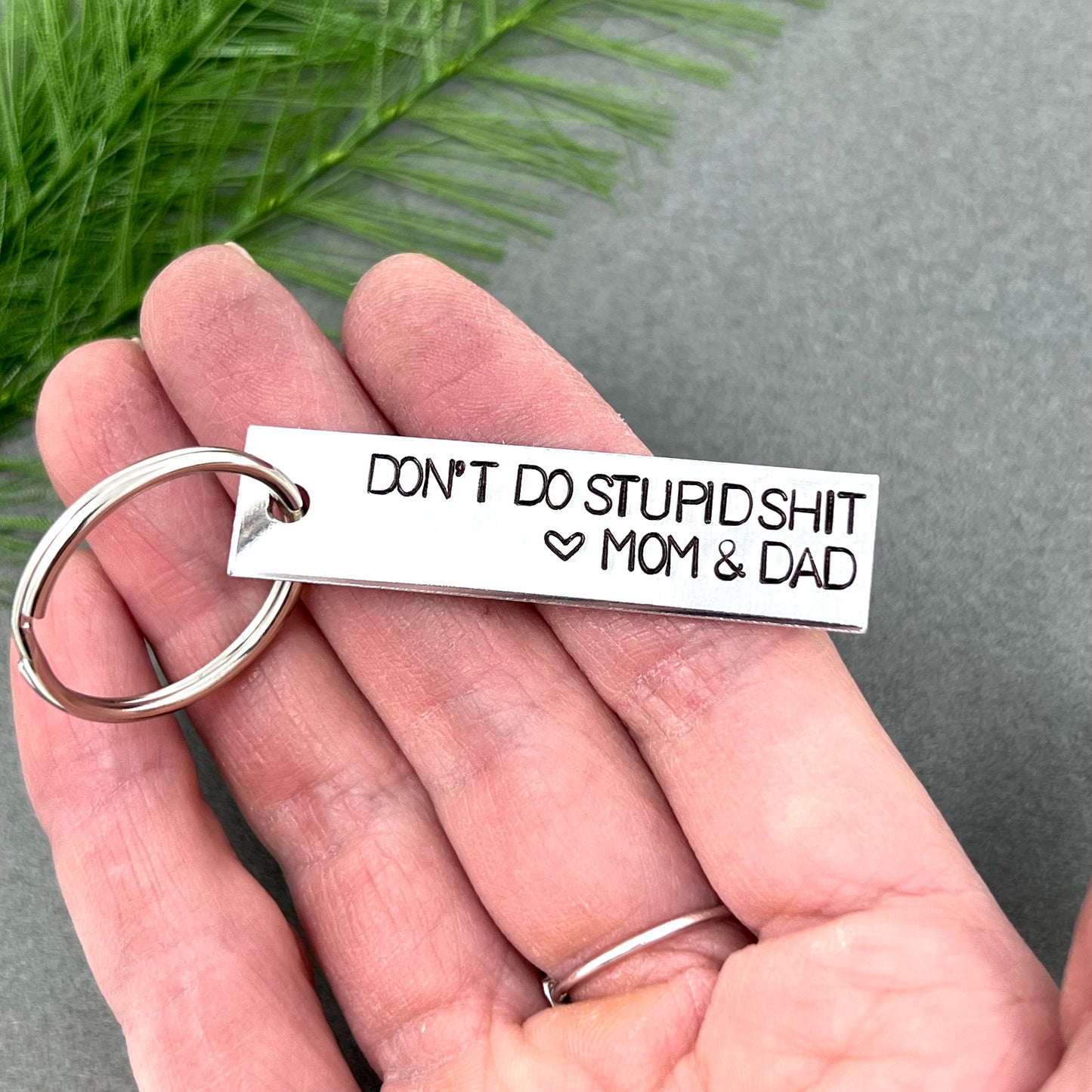 Don't Do Stupid Shit Keychain From Mom & Dad