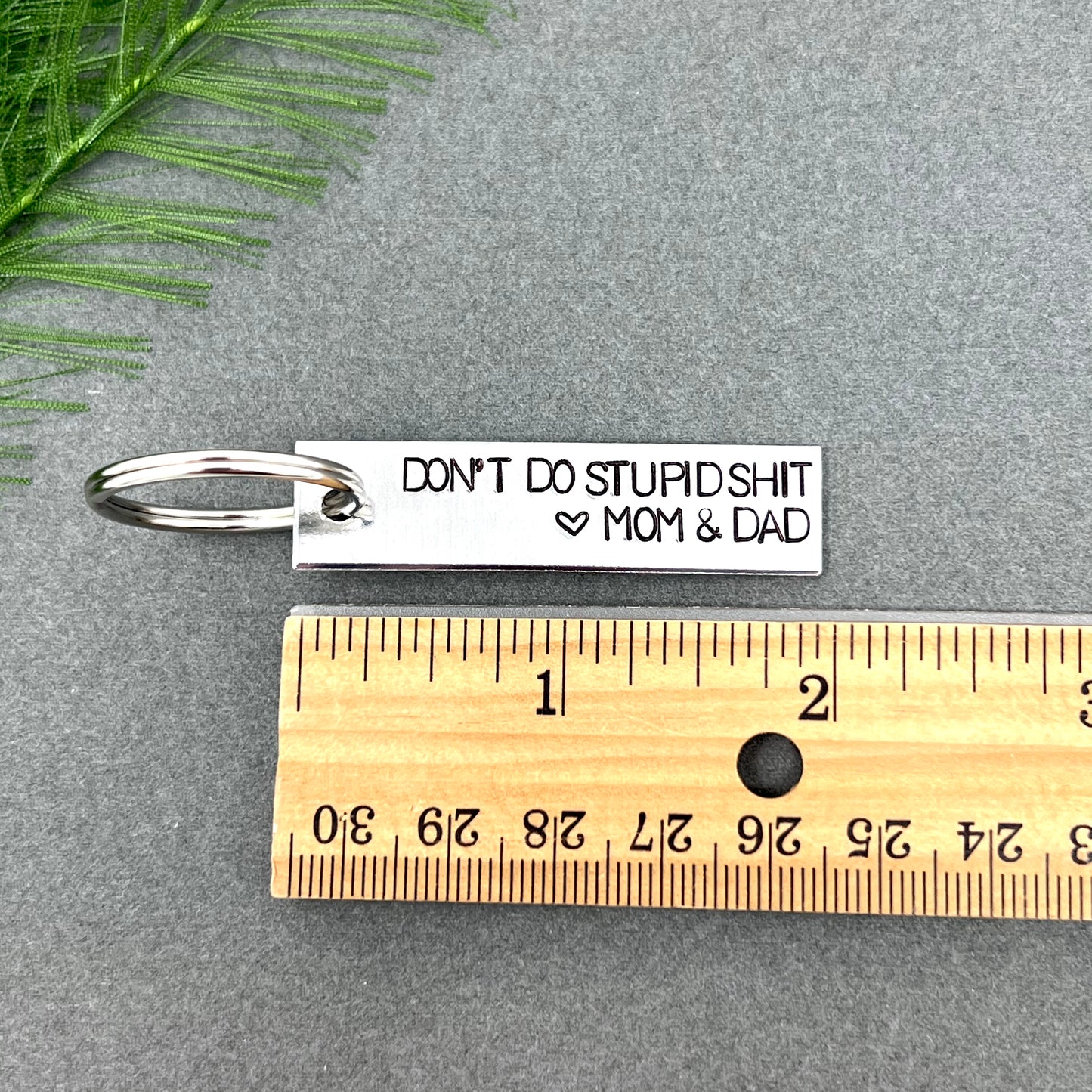 Don't Do Stupid Shit Keychain From Mom & Dad